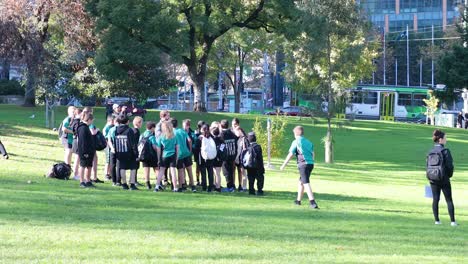 group of children assembling in a park