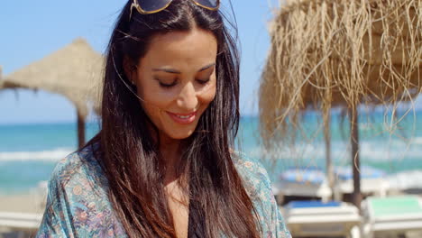 Smiling-Lady-at-the-Beach-Looking-Into-Distance