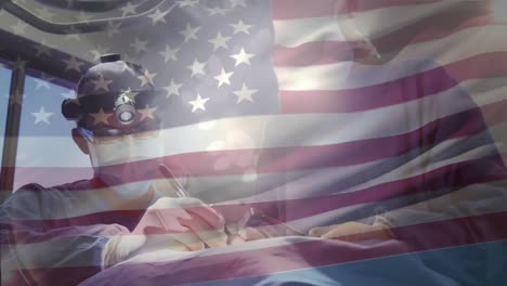 animación de la bandera de los estados unidos ondeando sobre el cirujano en la sala de operaciones