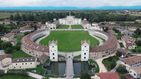 Aerial-Forward-Drone-Shot-of-Villa-Manin-with-Birds-crossing---Udine-Italy