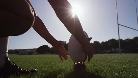 rugby player throwing the rugby ball