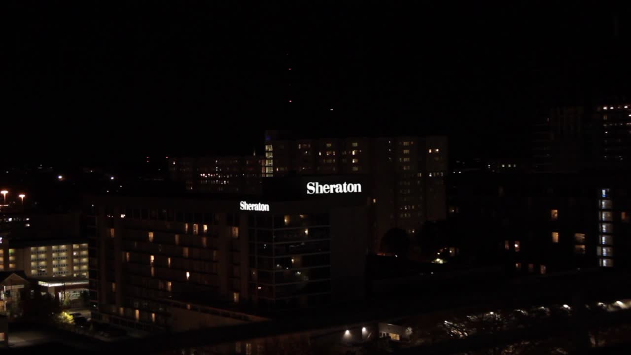 Sheraton building in night sky view in Atlanta, GA