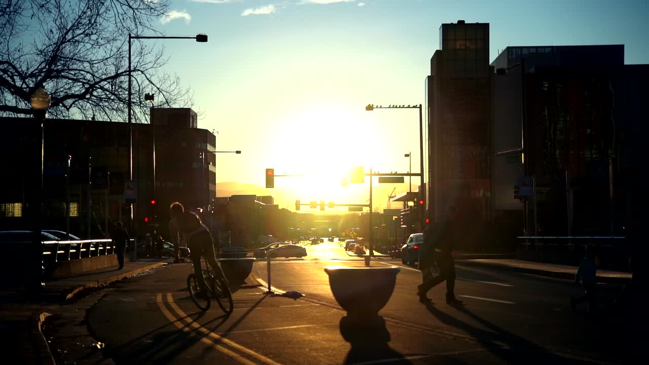 Pedestrians crossing a street in slow motion