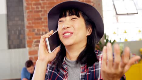 Happy-woman-talking-on-mobile-phone-4k