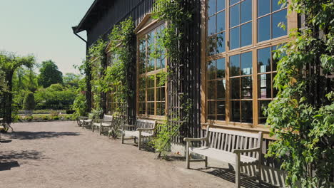 modern shed-style restaurant - event venue surrounded by greenery