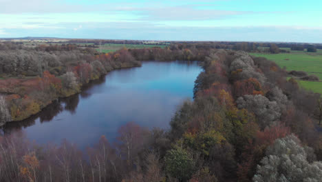 A-German-lake-surrounded-by-forests-from-above