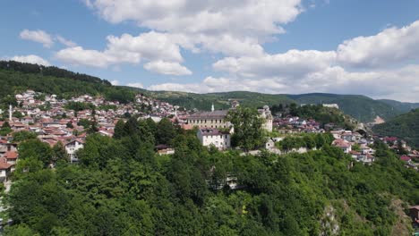 Jajce-Kasarna-aerial-view-circling-historic-former-barracks-in-the-lush-hills-of-Sarajevo,-Bosnia