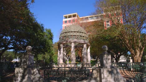 establishing shot of the mecom rockwell colonnade monument area in the houston museum district