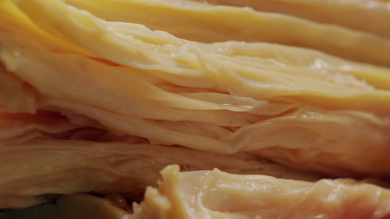 Fermented soy food Fuzhou, Tofu skin yuba sticks or Fuzhu on plate. Healthy asian soy food, Korean and Chinese cuisine.