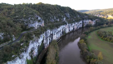 cliffside trail above lot river at sunset with serene natural beauty
