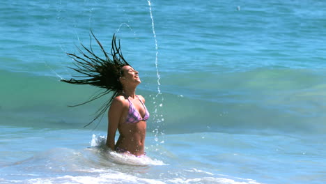 woman tossing her hair with sensuality