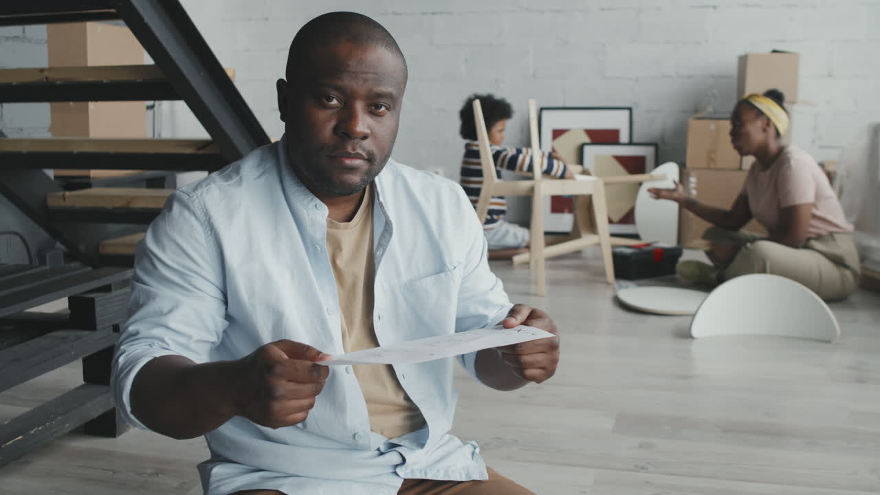 Family Assembling Furniture Together