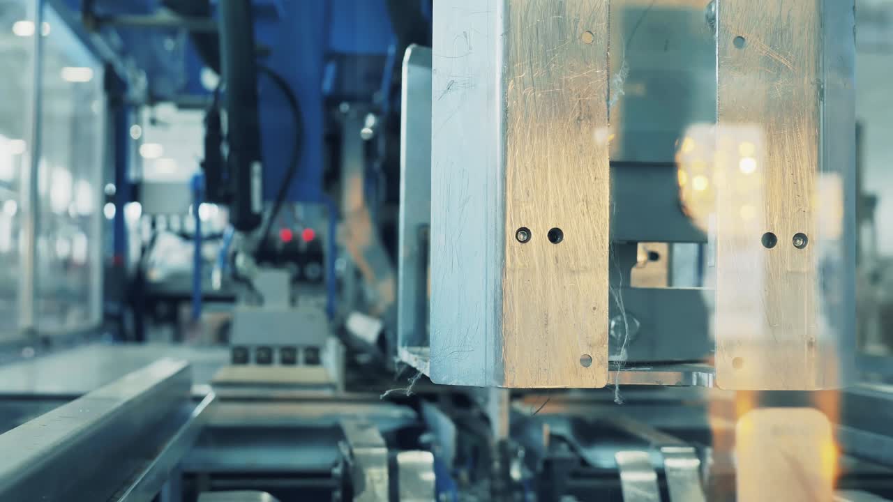 Factory machine is processing cardboard sheets