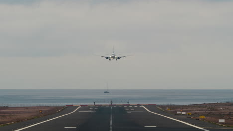 airplane flies to the airport