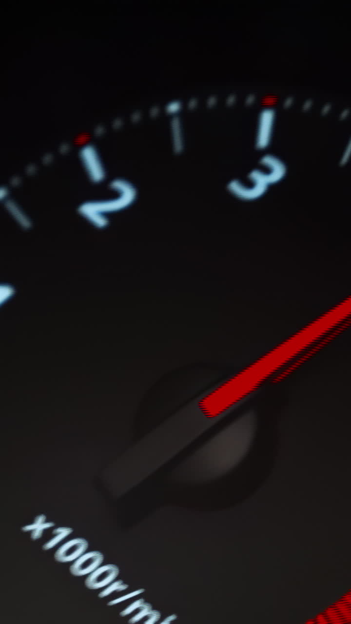 Car Dashboard Tachometer Close-Up