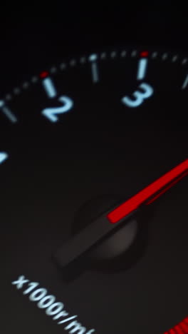 car dashboard tachometer close-up