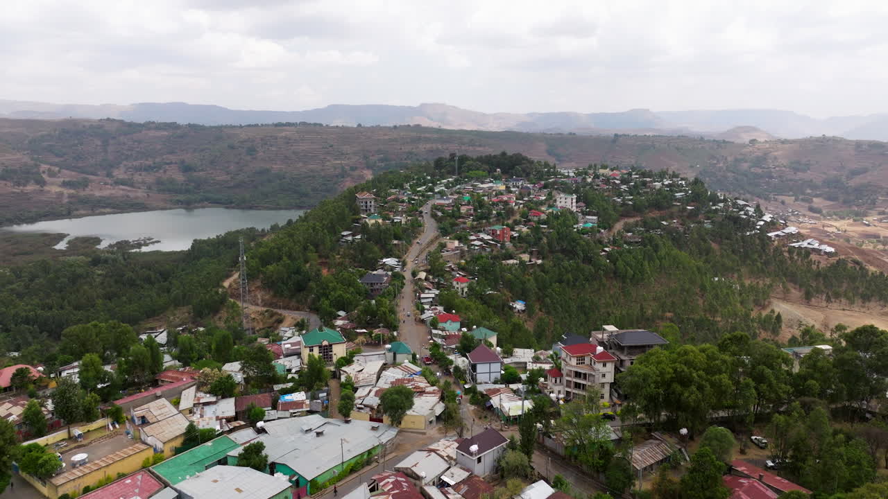 Angereb Reservoir And Mountains From Gondar City In Ethiopia. - aerial shot