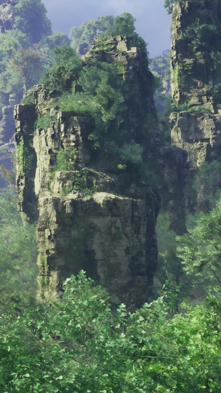 Majestic rock formations surrounded by lush greenery in mountainous area