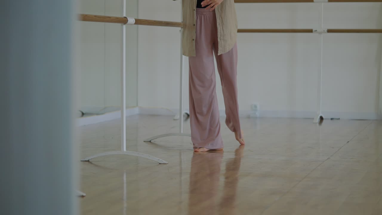 Ballet Barre Exercises in Dance Studio