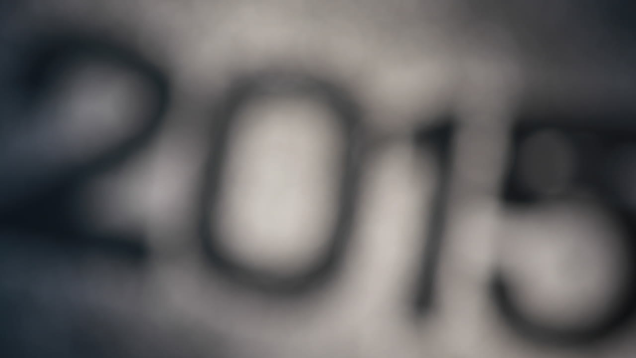 2015 in glitter on black surface