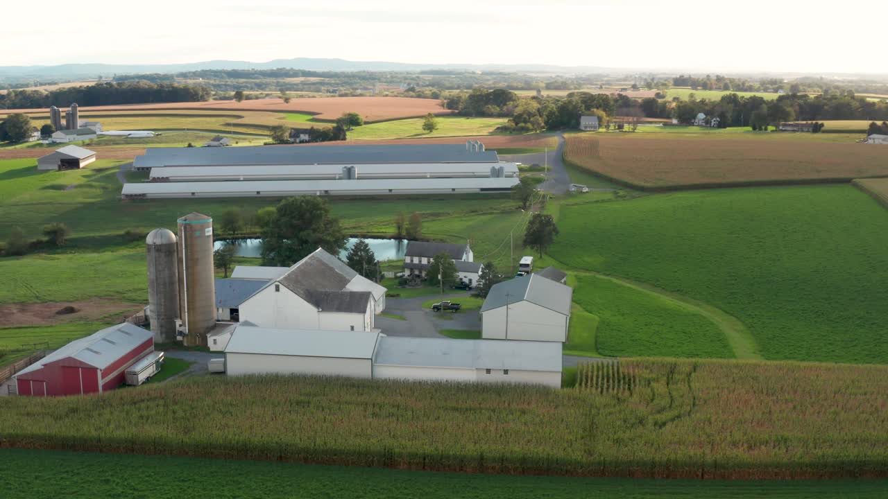 Aerial orbit of family farm in rural America