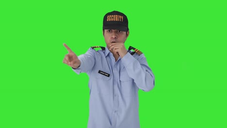 Angry-Indian-security-guard-stopping-someone-by-using-whistle-Green-screen