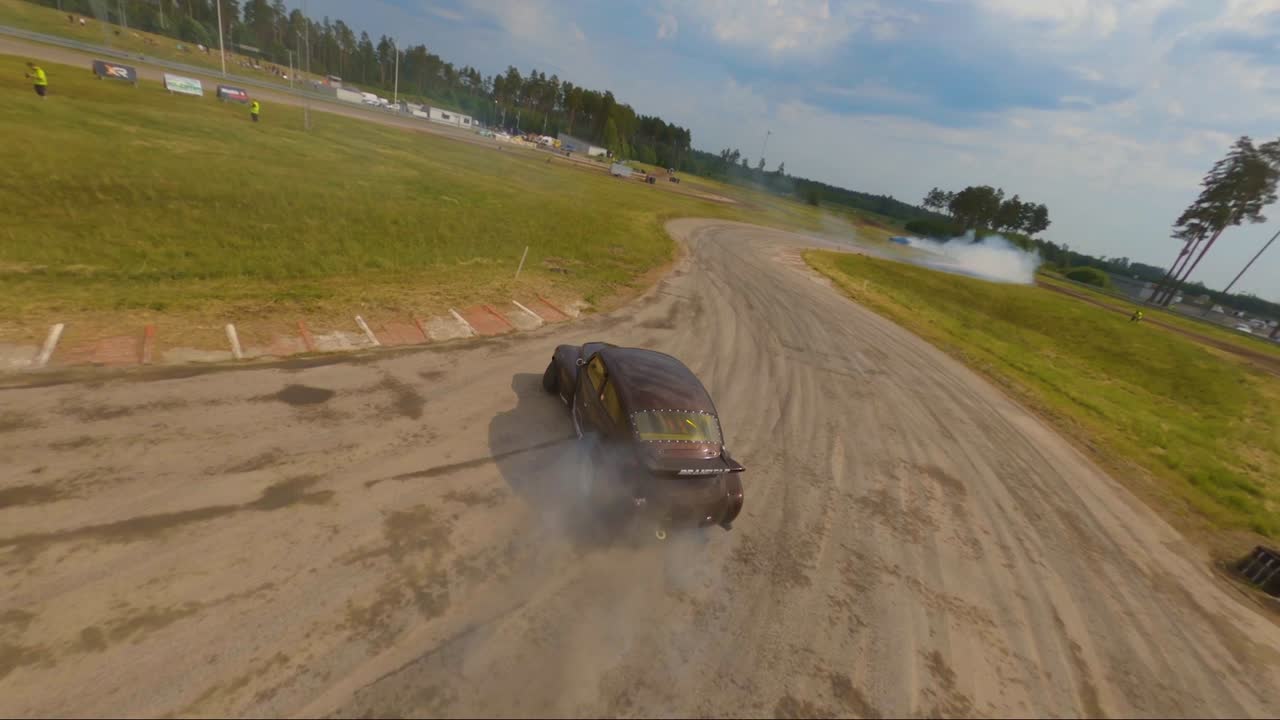 Brown race car drifting at Lidköping Motorstadion