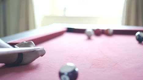 potting a solid colour on the snooker table