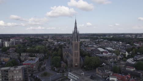 drone orbiting view sint vituskerk church in hilversum