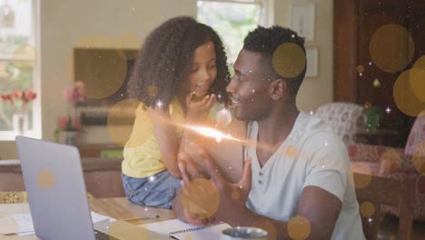 animation of light and dots moving over happy african american father and daughter using tablet