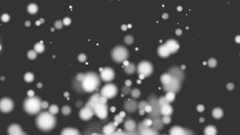 partículas redondas blancas voladoras con brillos en degradado negro de moda