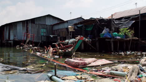 plastic derbis pollution in a floating village in cambodia