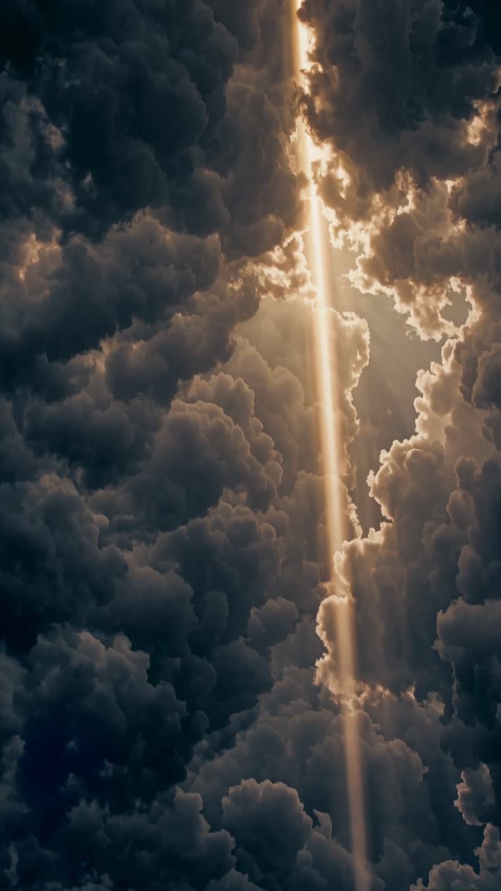 Dramatic upward angle captures sun rays piercing through dark clouds, creating a cinematic, ethereal