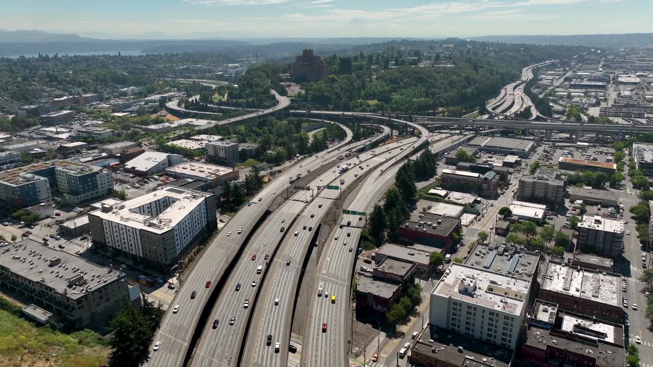 Wide drone shot of cars commuting on Seattle's freeway system