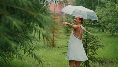 woman enjoying a rainy day in the park
