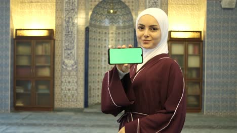 woman islamic book in phone