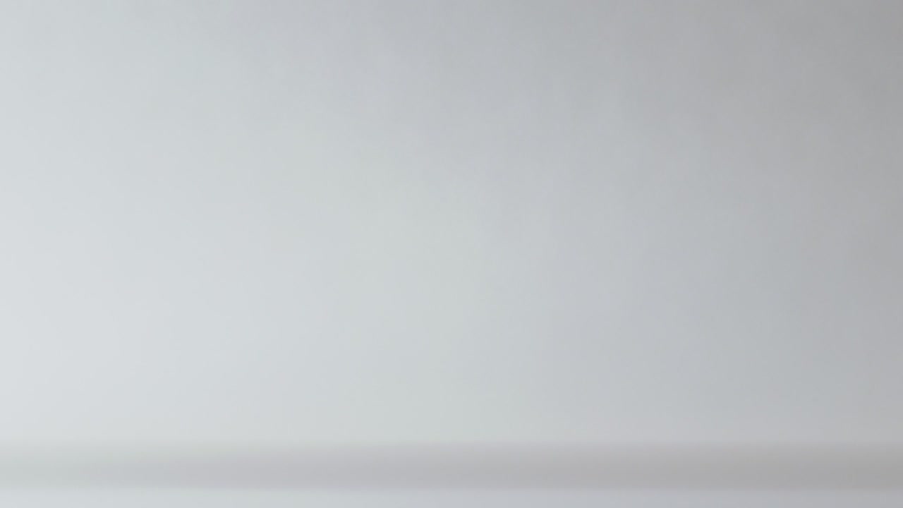 Pages of a book turn quickly, slow motion macro shot