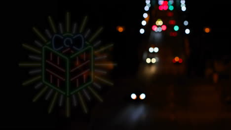 animación de neón parpadeante decoración de regalo de navidad sobre el fondo del tráfico vial