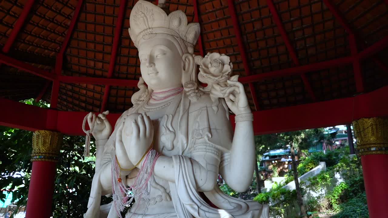 Amazing ornamented white stone statue in a old Buddhist Temple in Chiang Mai, Thailand.