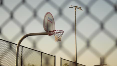 Basketball-hoop-with-ball-being-shot-into-the-net-without-touching-rim