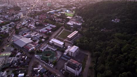 Aerial-orbit-of-the-Chile-Pavilion-in-Temuco,-residential-area-at-the-foothills-of-Cerro-Ñielol-Natural-Monument