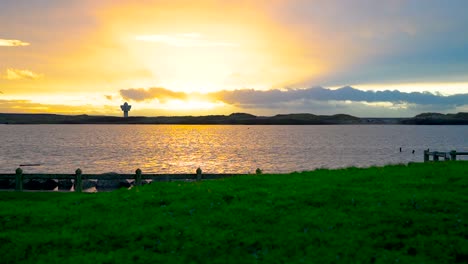 zoom in timelapse of colourful sunset sunrise above lake river water in pure nature unpolluted