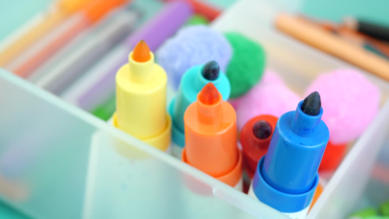 Colorful Markers in a Container