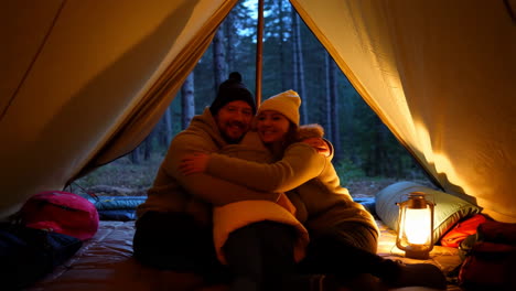 cozy family night camping inside a tent