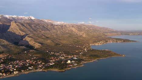 coastal town and velebit mountain aerial view, dalmatia region of croatia - drone shot