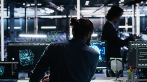 teamworking engineers brainstorming in data center, reviewing ai diagnostics