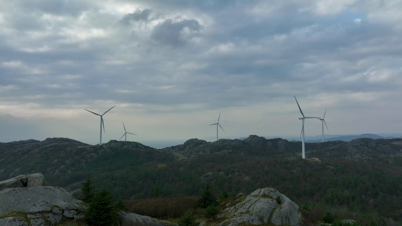 Norwegian wind farm produces eco-friendly power in natural coastal setting.