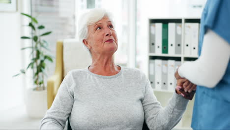 Holding-hands,-caregiver-and-happy-senior-woman