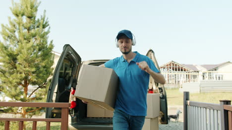 delivery person dancing while delivering packages