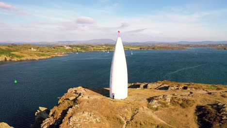 360 degree aerial view around the baltimore beacon in south west cork on ireland on a sunny summer day